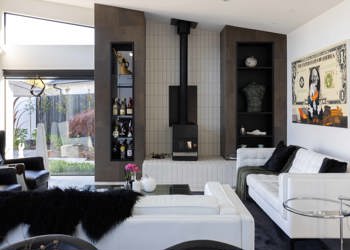 Wood Fireplace Surrounded By Monochrome Furnishings