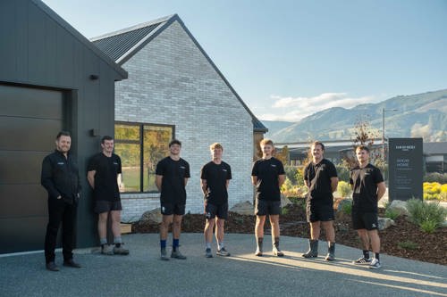 The David Reid Homes Nelson & Tasman build team outside the new show home at 14 Hallmark Drive, Richmond